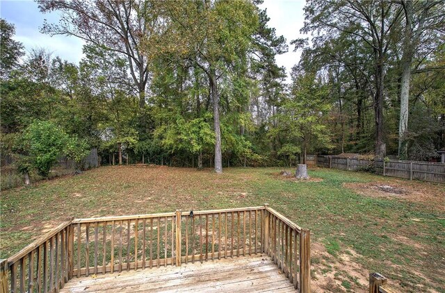 view of yard featuring a wooden deck