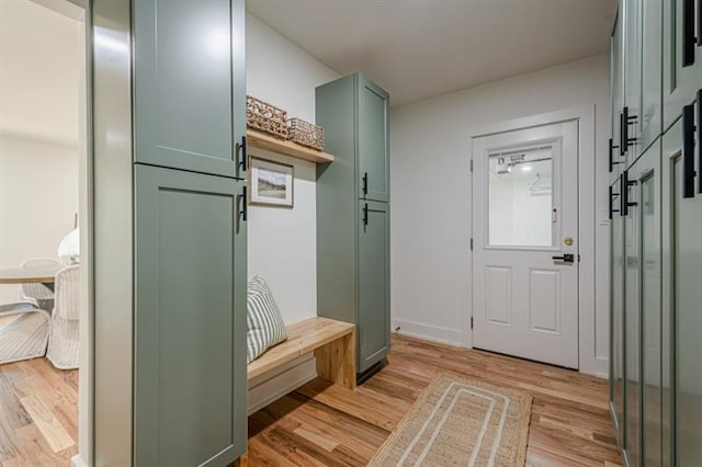 mudroom with light wood-style floors