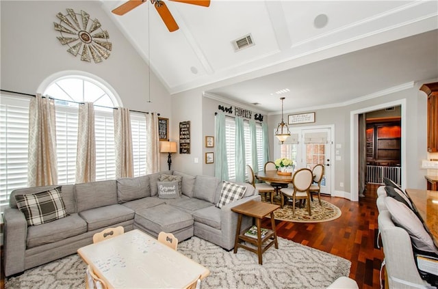 living area with visible vents, beamed ceiling, dark wood-style floors, high vaulted ceiling, and a ceiling fan