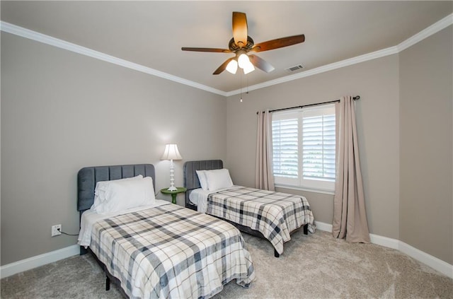 bedroom featuring visible vents, baseboards, crown molding, and light carpet
