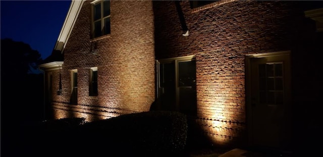 view of property exterior at twilight