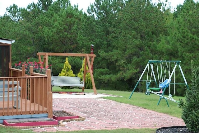 view of jungle gym with a lawn