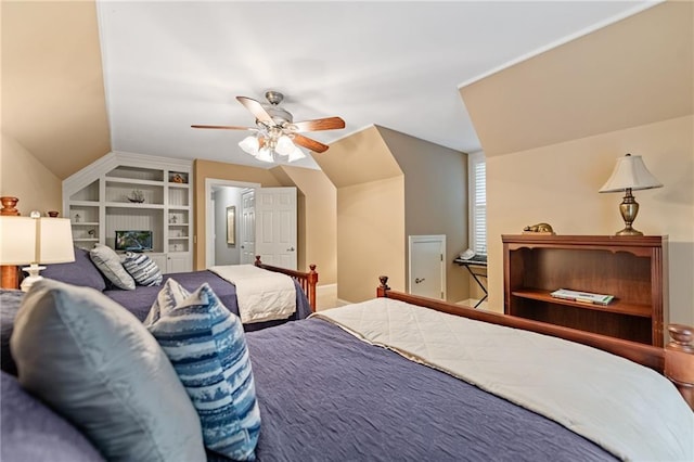 bedroom with ceiling fan and lofted ceiling