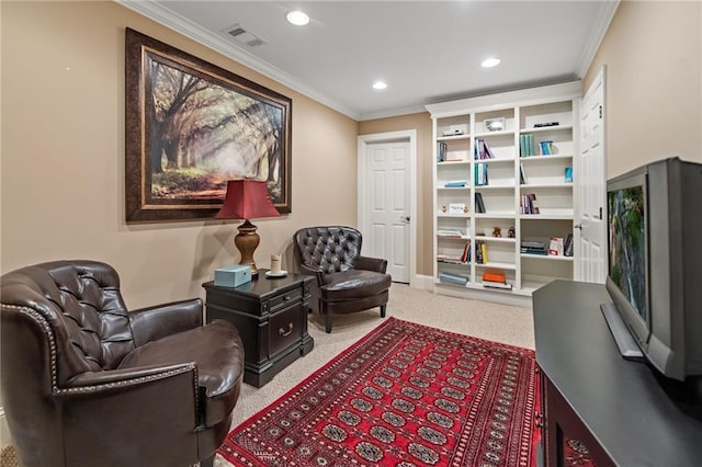 living area featuring ornamental molding and carpet flooring