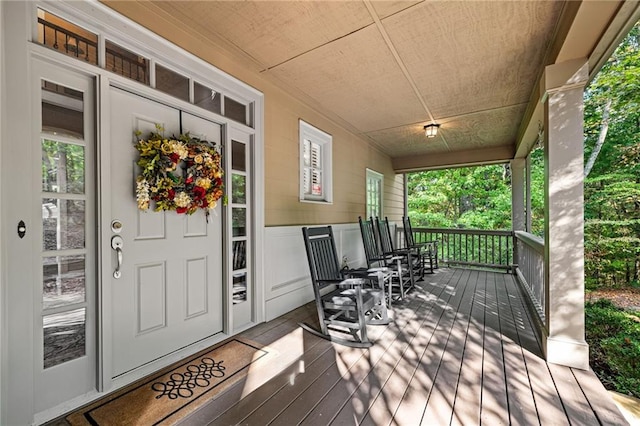 wooden terrace with covered porch