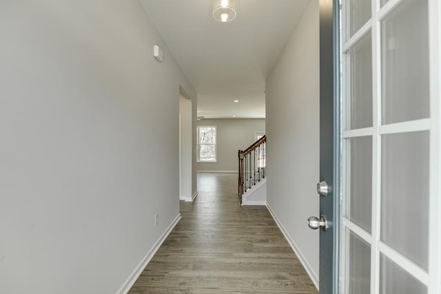 corridor featuring light hardwood / wood-style flooring