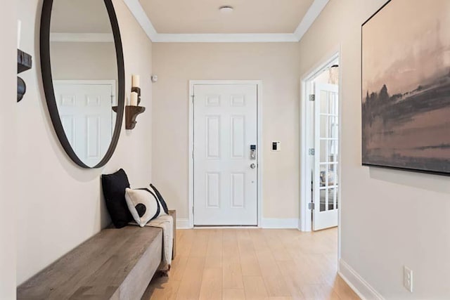 102 Sheryl Way, Loganville, GA 30052 - entrance foyer with light wood-type flooring, baseboards, and ornamental molding