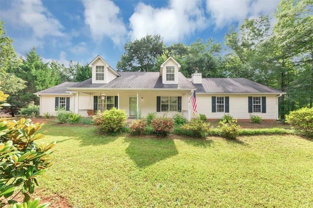 1050 Birdseye Vw, Locust Grove, GA 30248 - cape cod house featuring a front lawn and covered porch