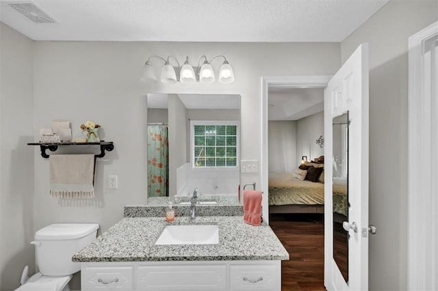 1050 Birdseye Vw, Locust Grove, GA 30248 - ensuite bathroom featuring vanity and wood finished floors