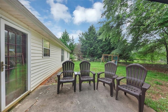1050 Birdseye Vw, Locust Grove, GA 30248 - view of patio featuring a playground
