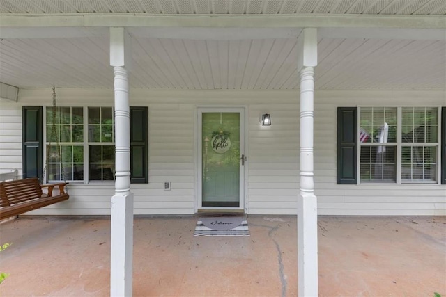 1050 Birdseye Vw, Locust Grove, GA 30248 - view of exterior entry with a porch