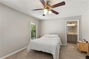 4406 Idlewood Ln, Tucker, GA 30084 - bedroom with baseboards, ceiling fan, light colored carpet, and ensuite bathroom