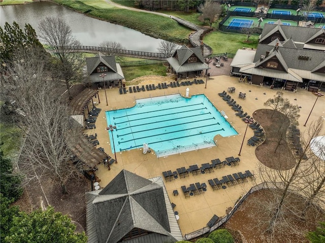 community pool featuring a water view