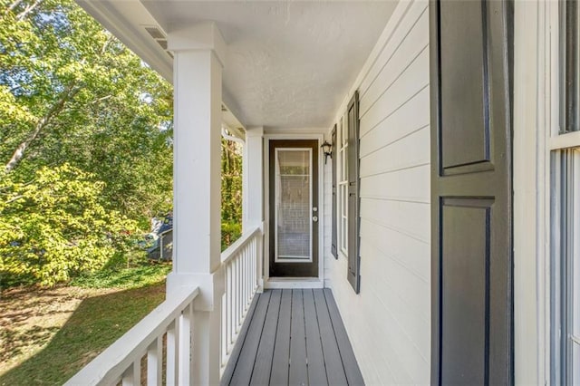 property entrance featuring covered porch