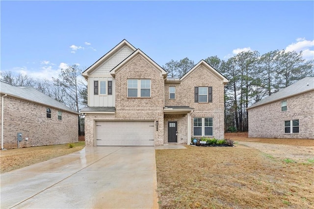 view of front of house with a garage and a front lawn