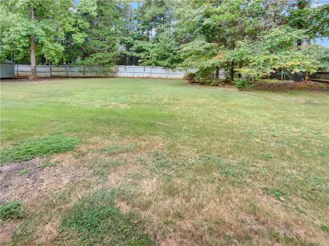 view of yard featuring fence