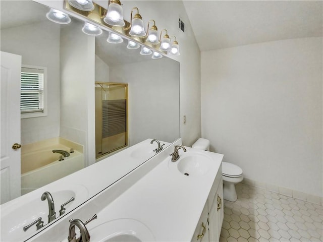 bathroom with lofted ceiling, a sink, and tile patterned floors