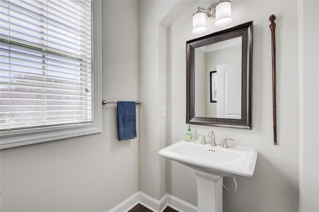bathroom featuring baseboards