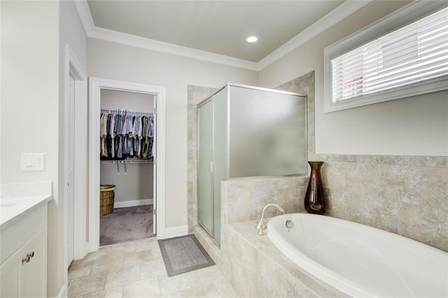 full bath with a walk in closet, vanity, a shower stall, ornamental molding, and a bath