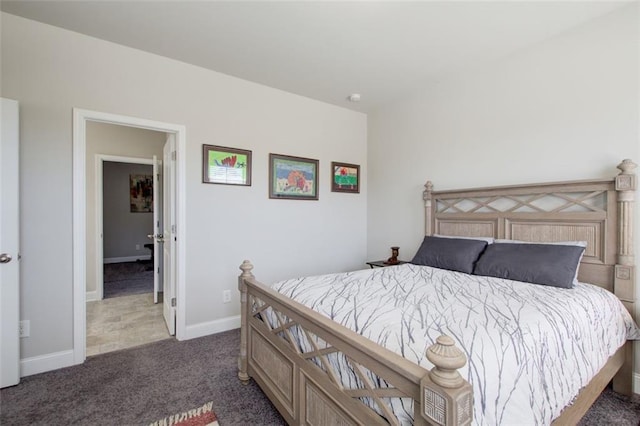 carpeted bedroom with baseboards