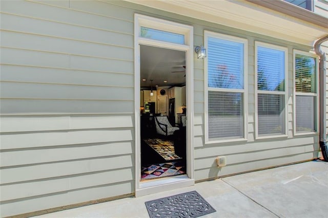 doorway to property with a patio