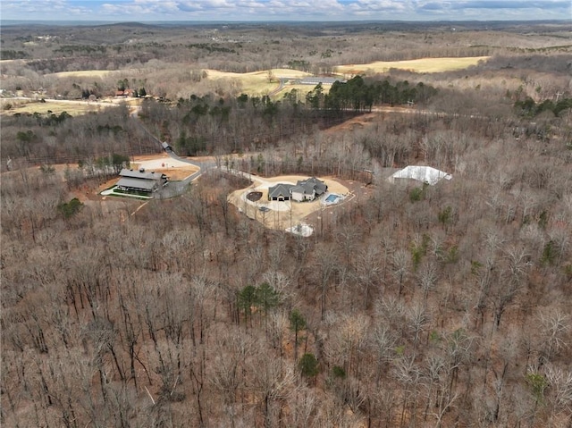 birds eye view of property featuring a rural view