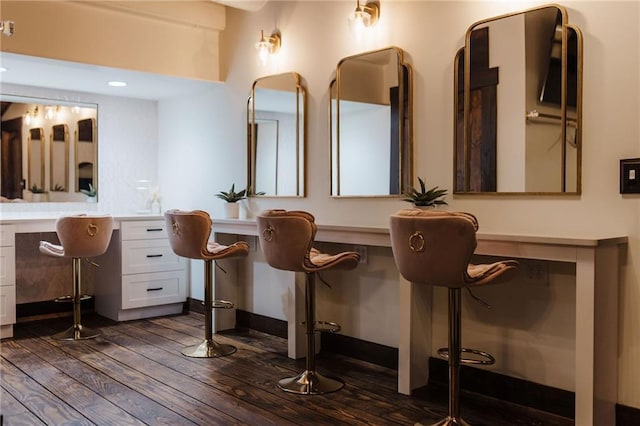 bathroom with hardwood / wood-style flooring