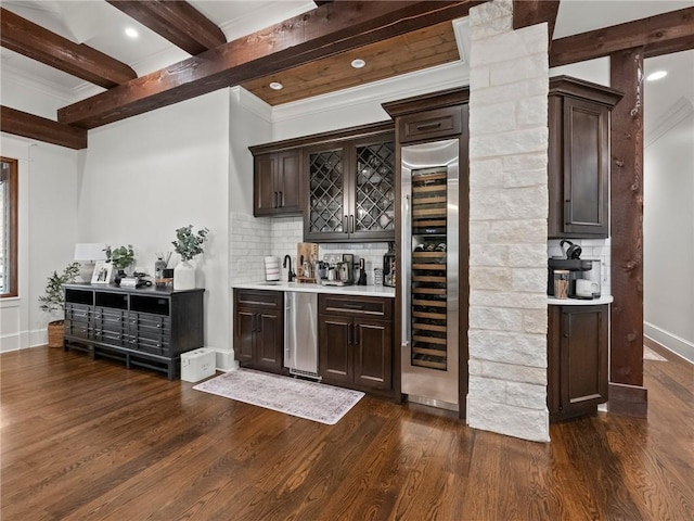 bar featuring wine cooler, beamed ceiling, dark wood finished floors, and wet bar