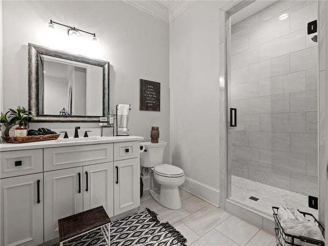 full bathroom featuring toilet, ornamental molding, a shower stall, baseboards, and vanity