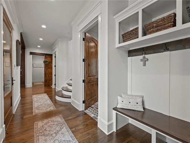 mudroom featuring crown molding, recessed lighting, wood finished floors, and baseboards