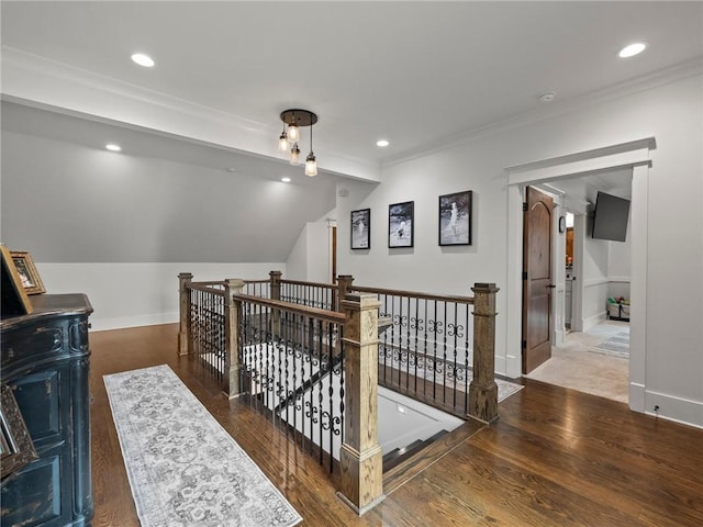 additional living space featuring recessed lighting, baseboards, and wood finished floors