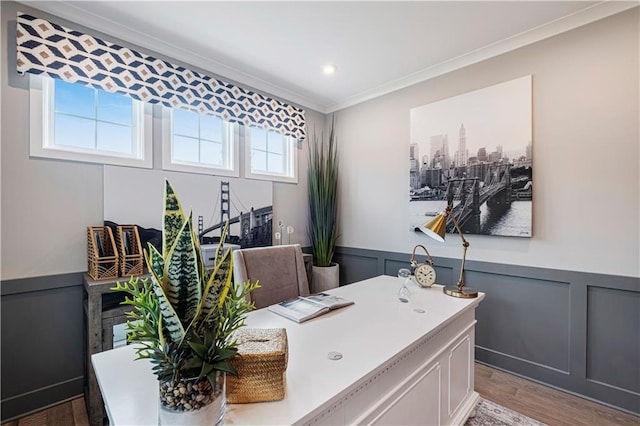 office area with crown molding and hardwood / wood-style flooring