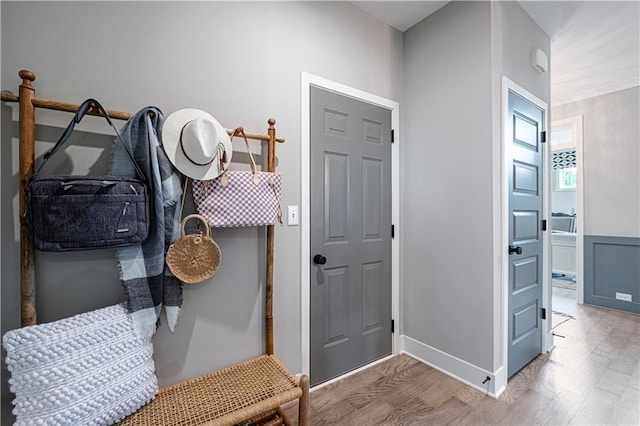 mudroom with hardwood / wood-style flooring