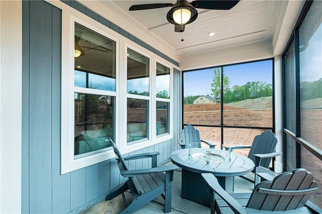 sunroom / solarium with ceiling fan