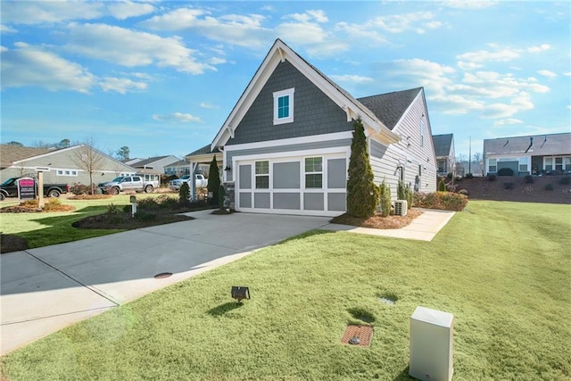 exterior space with a garage and a yard