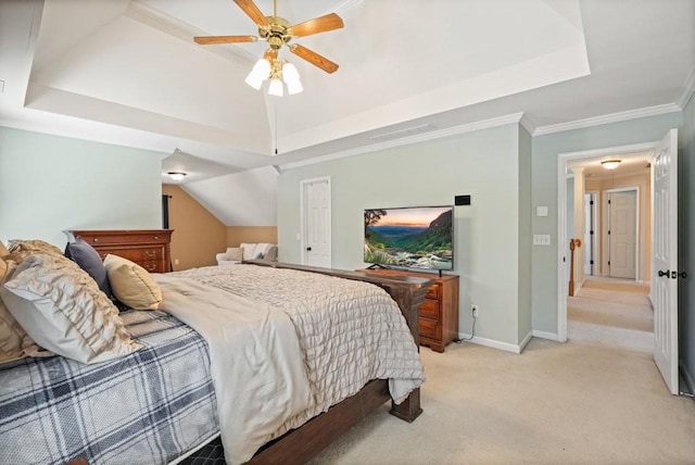 bedroom featuring baseboards, ornamental molding, light carpet, a raised ceiling, and a ceiling fan