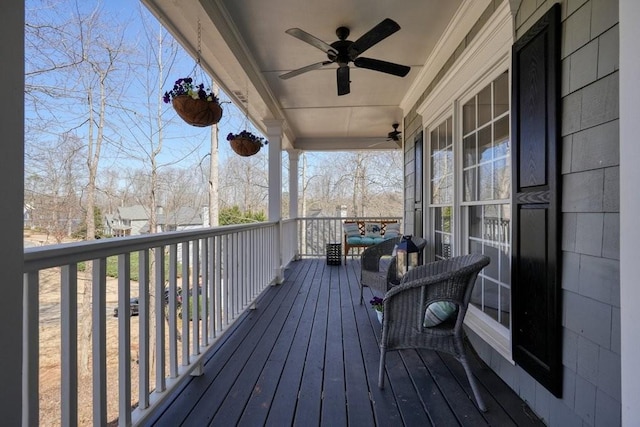 wooden terrace with ceiling fan