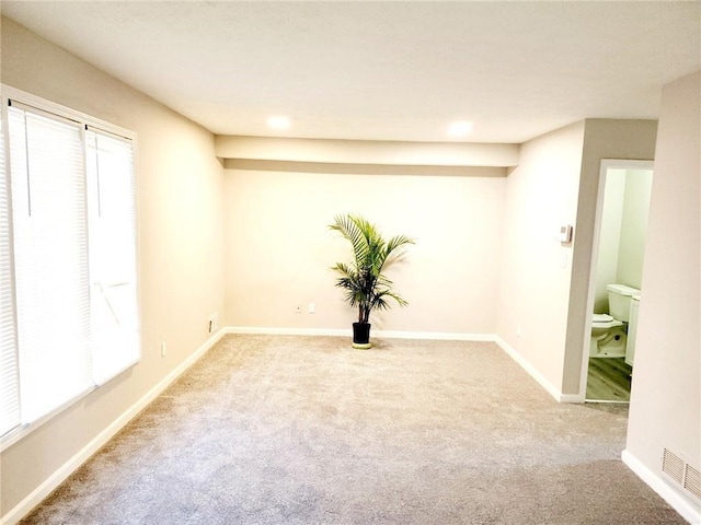 view of carpeted spare room