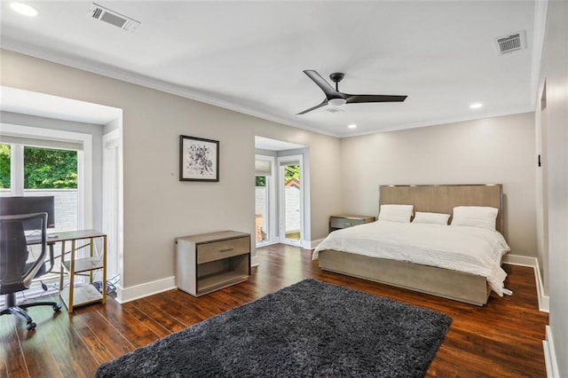 bedroom with ornamental molding, dark wood-type flooring, and ceiling fan