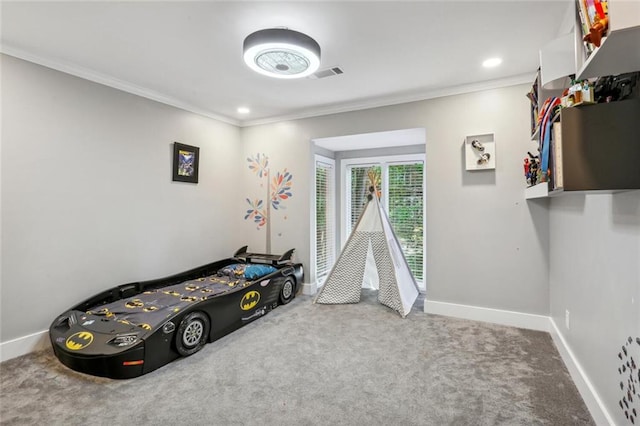 bedroom with carpet flooring and crown molding