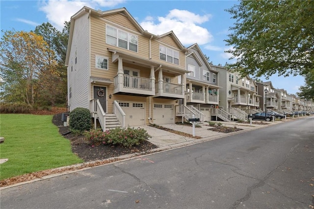 townhome / multi-family property with a garage and central AC