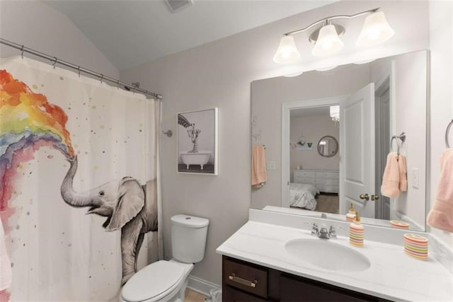 bathroom with visible vents, toilet, vanity, ensuite bath, and vaulted ceiling