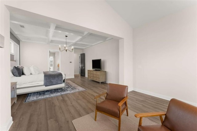 bedroom with coffered ceiling, baseboards, beamed ceiling, a notable chandelier, and wood finished floors