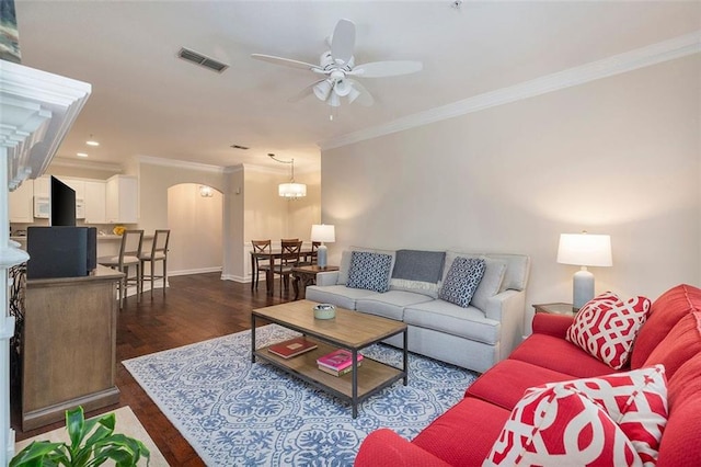 2400 Cumberland Pkwy SE Unit 613, Atlanta, GA 30339 - living room with arched walkways, a ceiling fan, ornamental molding, dark wood finished floors, and baseboards