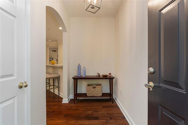2400 Cumberland Pkwy SE Unit 613, Atlanta, GA 30339 - foyer with dark wood-style flooring, arched walkways, and baseboards