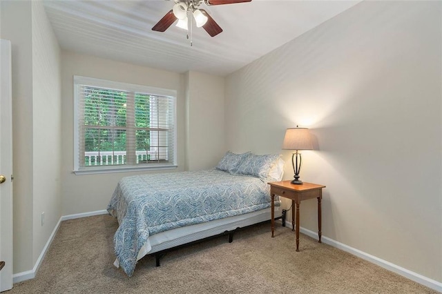 2400 Cumberland Pkwy SE Unit 613, Atlanta, GA 30339 - bedroom with carpet flooring, baseboards, and ceiling fan