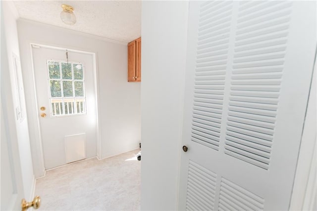 interior space featuring a textured ceiling