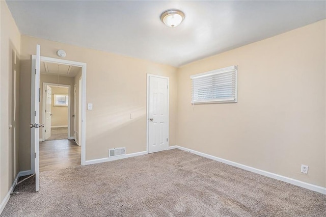 view of carpeted spare room