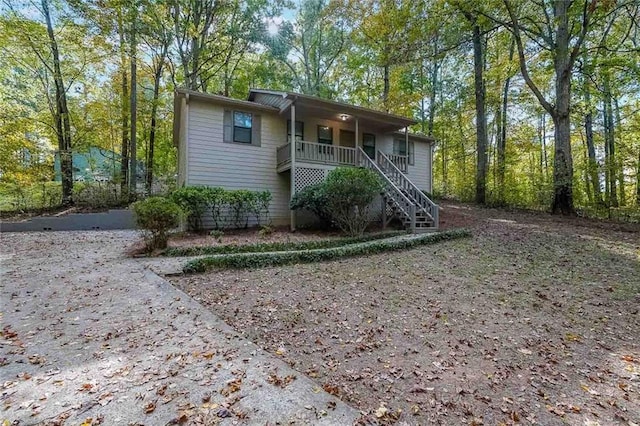 view of property with covered porch