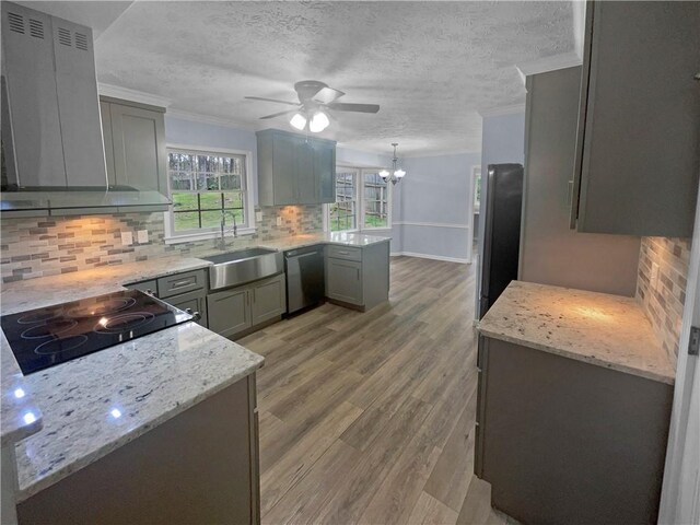 bathroom with vanity, bathing tub / shower combination, crown molding, a textured ceiling, and wood-type flooring